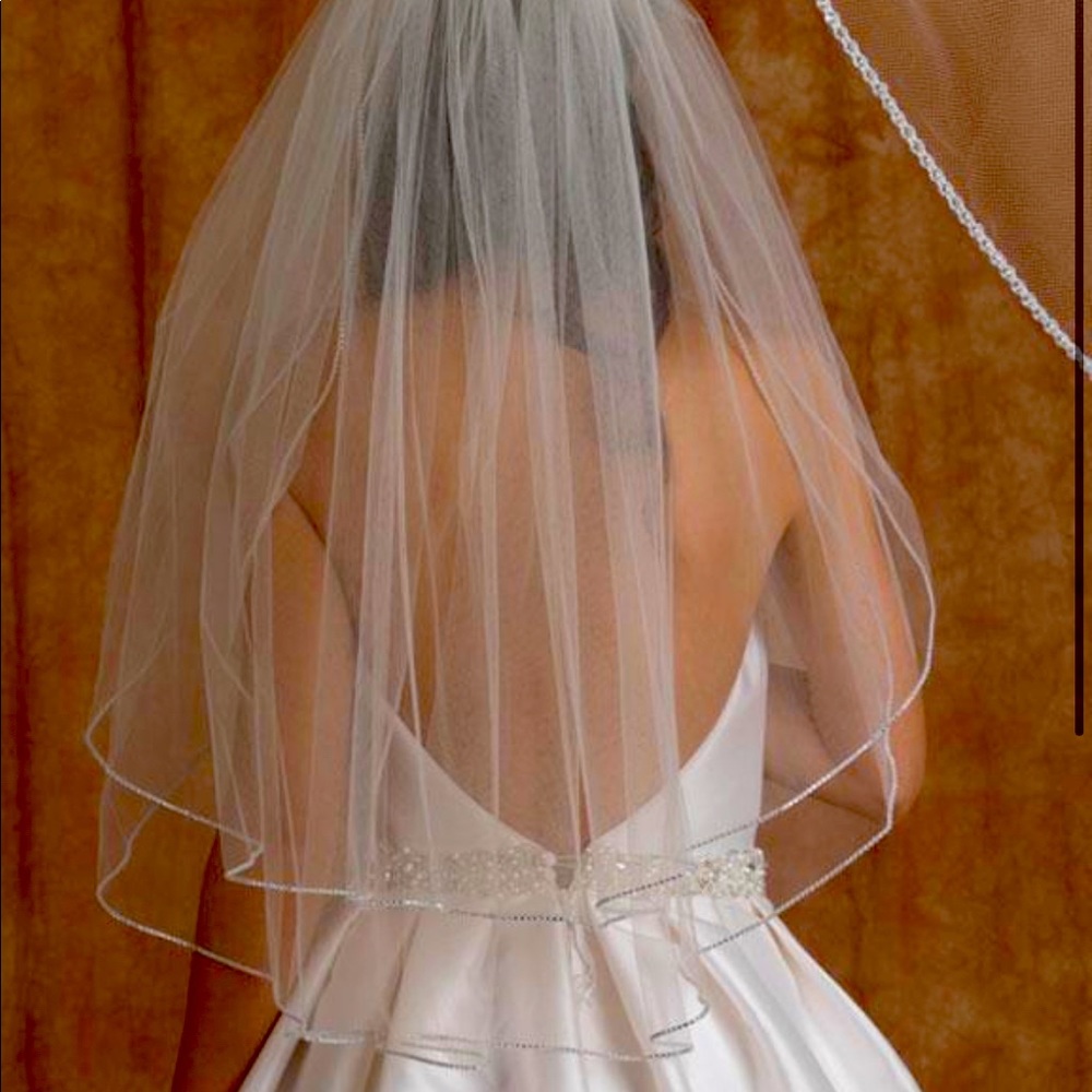 Edward E Berger Bridal Veil, never been worn.